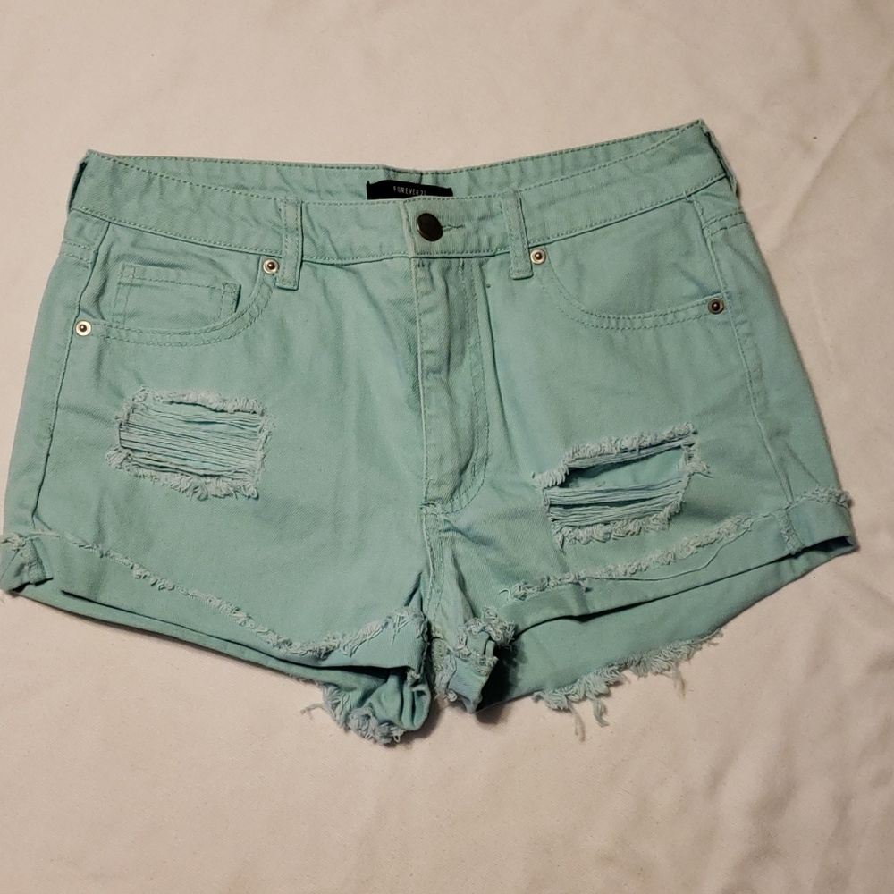 Forever 21 high rise ripped jean shorts.